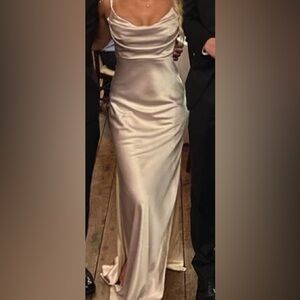 Satin full length gown perfect for day or evening wear.
